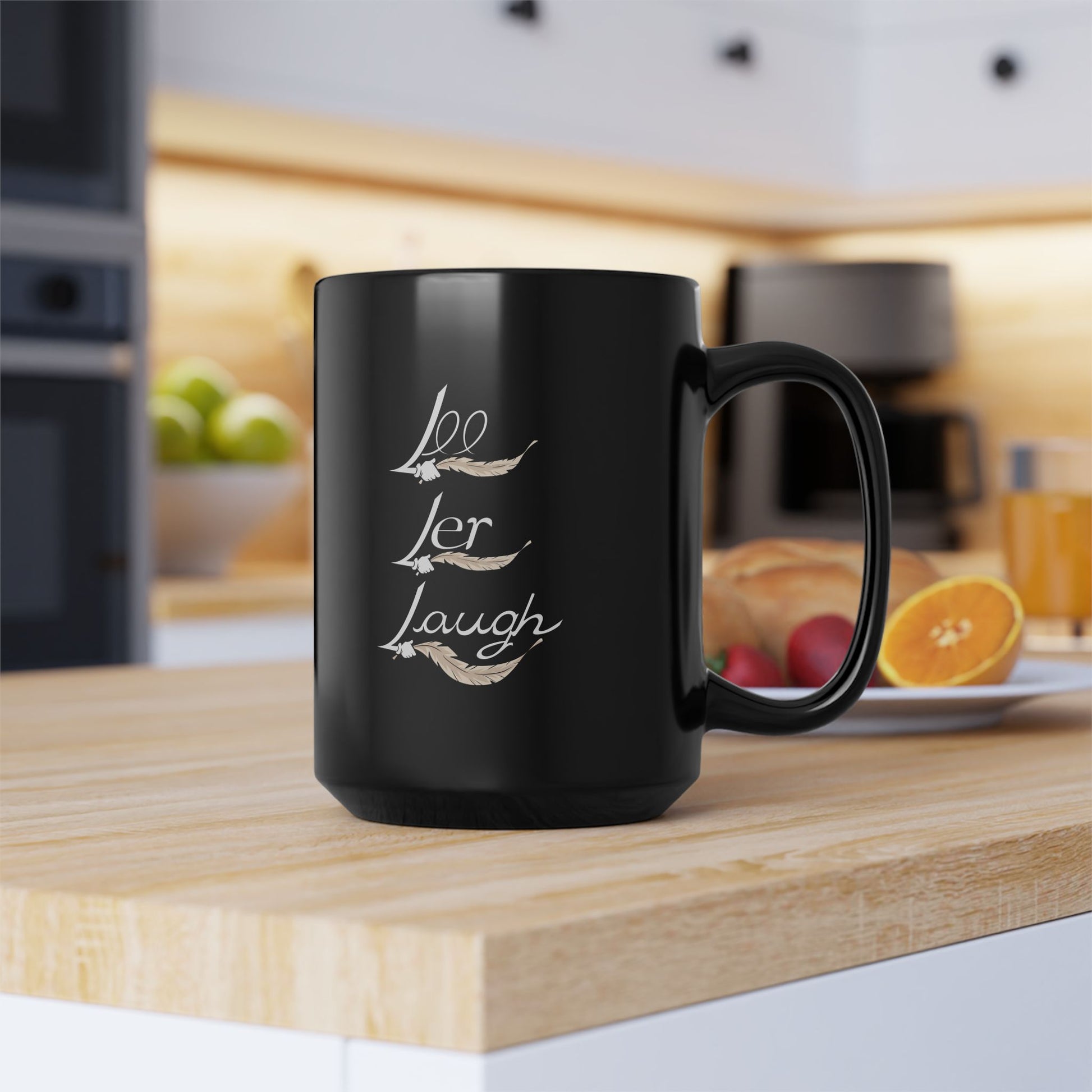 A pair of black ceramic mugs with unique designs on each side. One mug features a tickle fetish cartoon character with large tickling feathered wings, wearing red sneakers and holding a steaming cup of tea, with the words "T-Time" above it. The other mug showcases the phrase "Lee Ler Laugh" written. The mugs have a glossy finish and a sturdy handle, giving them a sleek and stylish appearance for tickling kink.